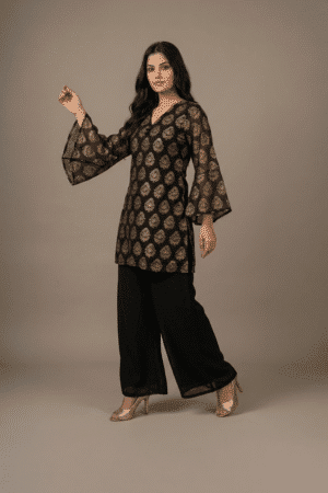 Black and gold printed kurta set with flared sleeves and wide-leg palazzo pants