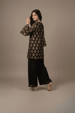 Black and gold printed kurta set with flared sleeves and wide-leg palazzo pants