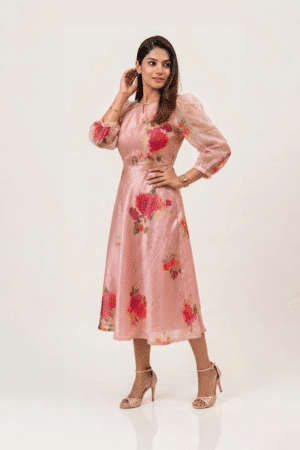 Woman wearing a Blossom Breeze Party Wear midi dress with three-quarter puff sleeves and an A-line silhouette