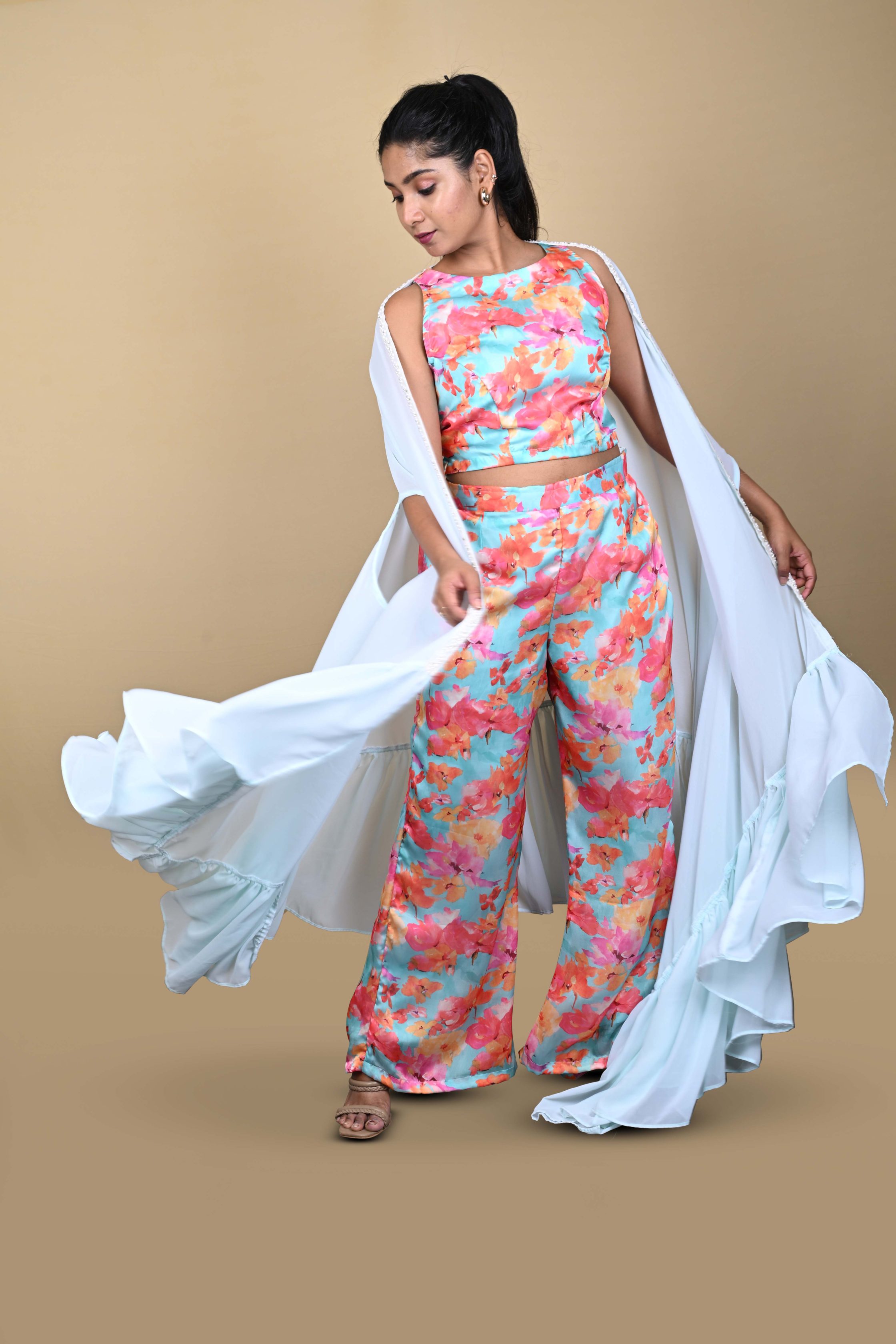 Satin silk blouse and wide-legged pant set with cape