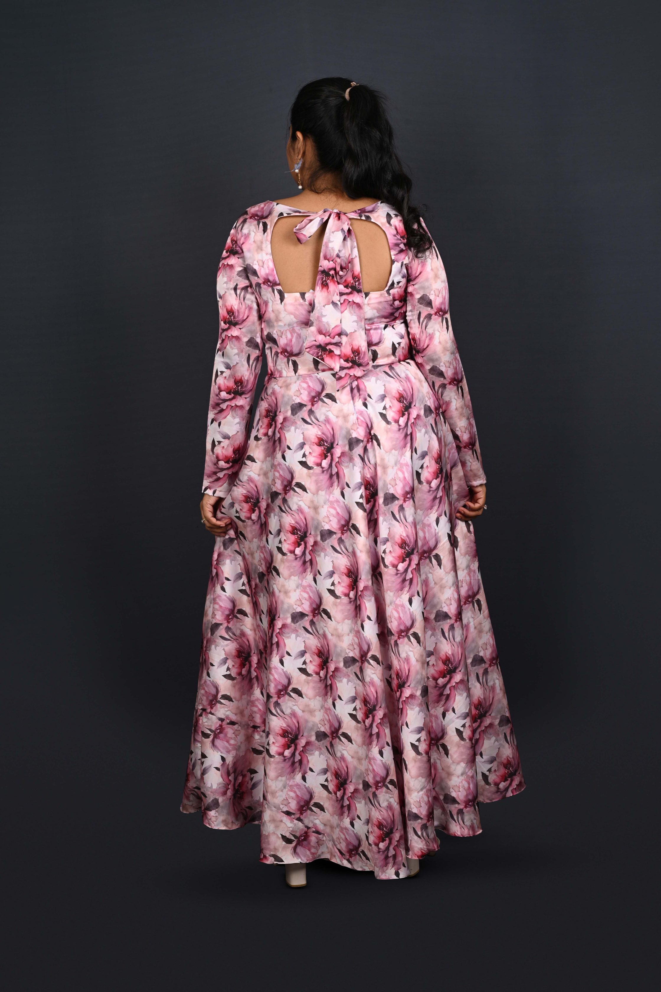 Full-length evening gown in floral satin with long sleeves