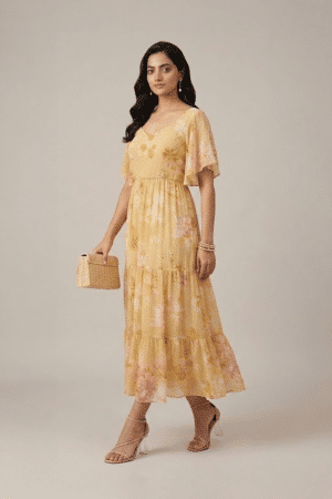Pastel yellow floral tiered maxi dress with flutter sleeves