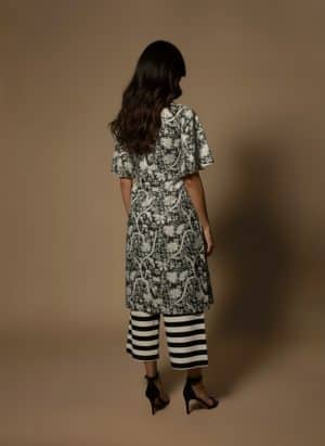 Black and white kurta set with flared sleeves, back view