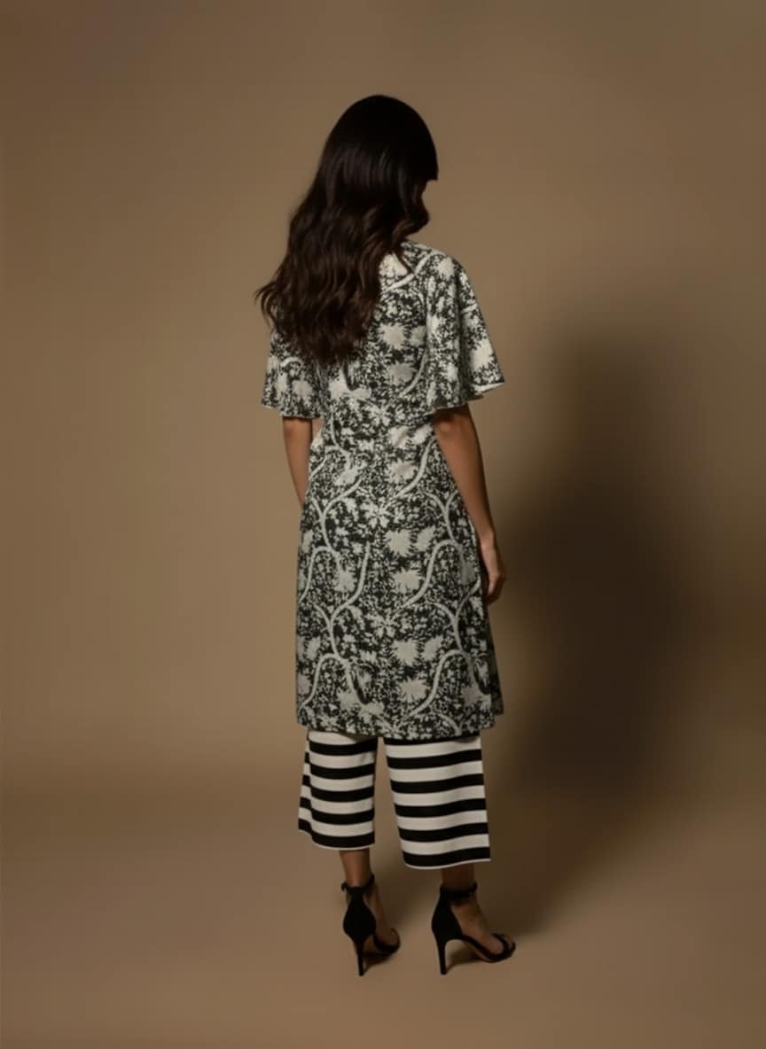 Black and white kurta set with flared sleeves, back view