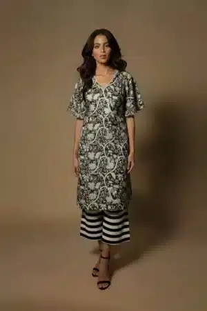 Black and white kurta set with flared sleeves, full-length front view