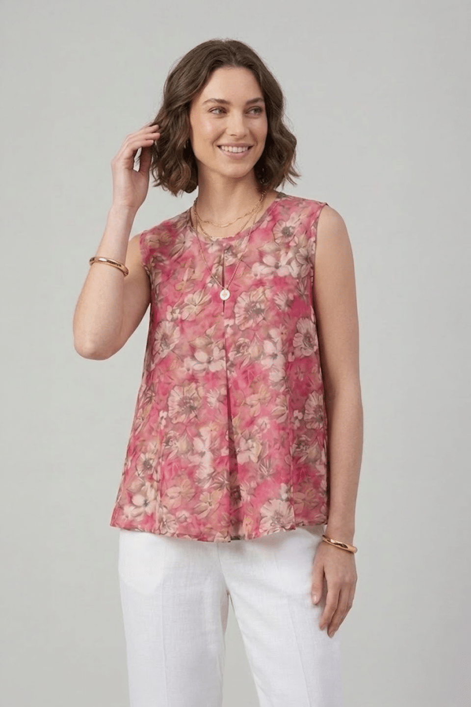 Pink Floral Top with sleeveless design and front pleat detail