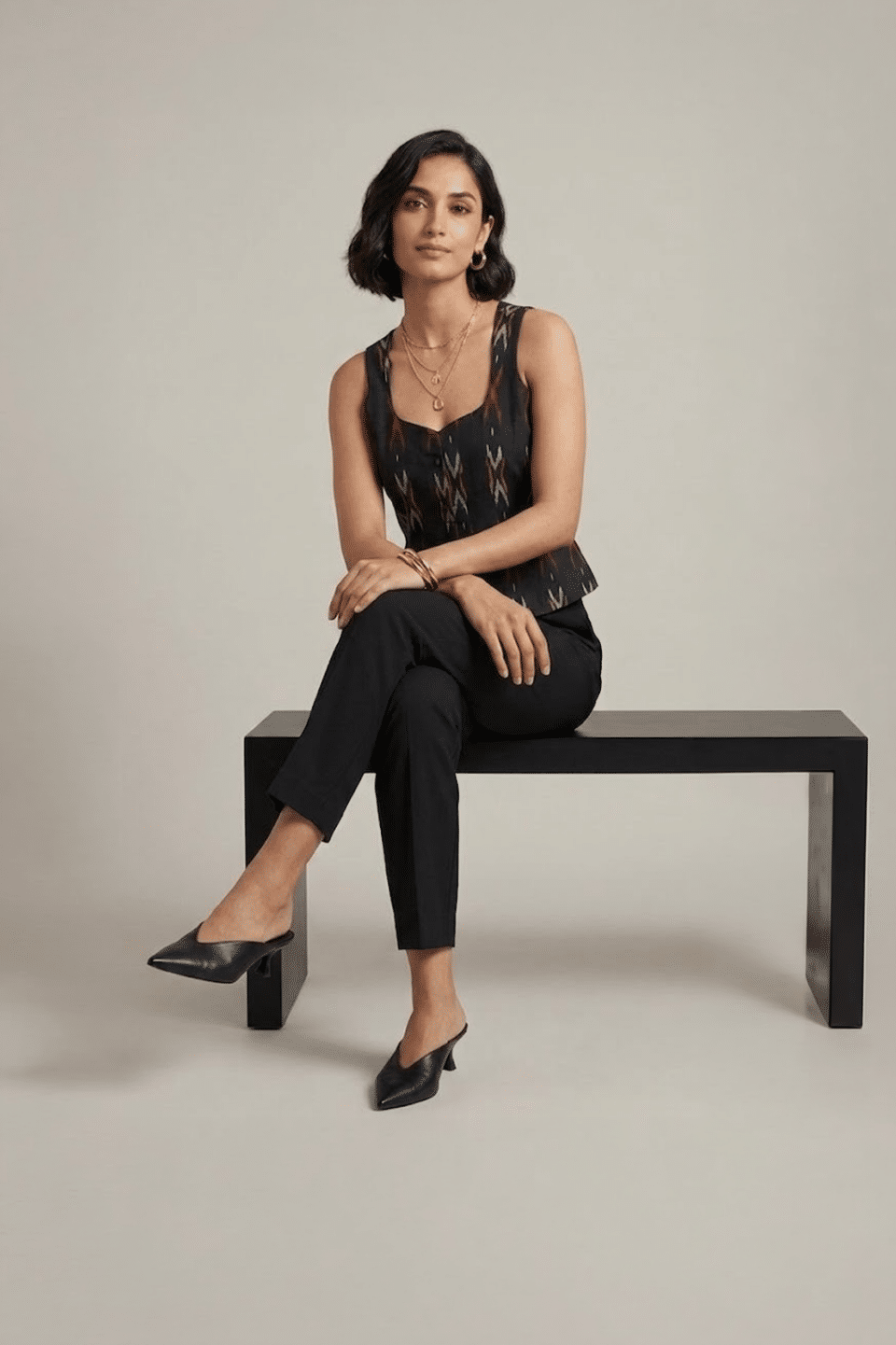 black ikat top for women with sleeveless design and tailored fit