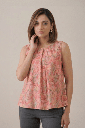 Peach Floral Pleated Top with sleeveless design and soft leaf print