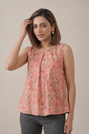 Peach Floral Pleated Top with sleeveless design and soft leaf print
