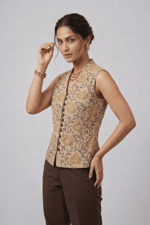 Mustard Floral Sleeveless Top with button-down front and brown trousers