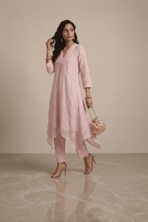 pink kurta set for women with asymmetrical hem and pants