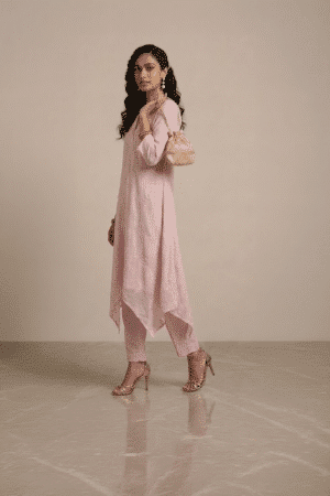 pink kurta set for women with asymmetrical hem and pants