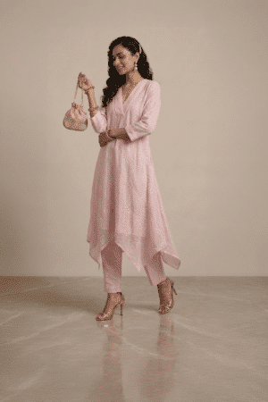 pink kurta set for women with asymmetrical hem and pants