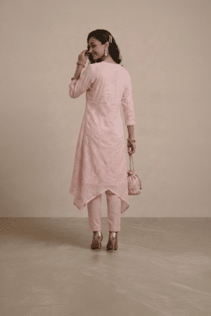 pink kurta set for women with asymmetrical hem and pants