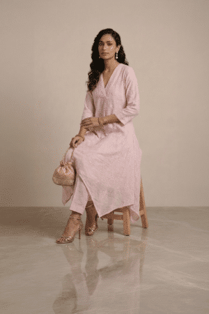 pink kurta set for women with asymmetrical hem and pants