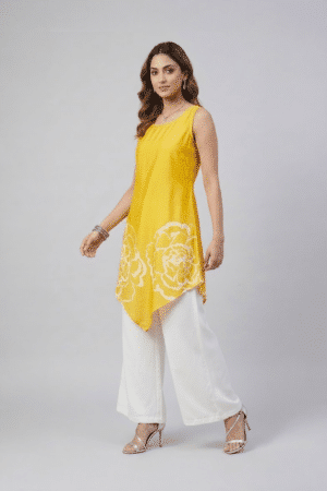 Yellow floral asymmetric tunic set with white wide-leg pants